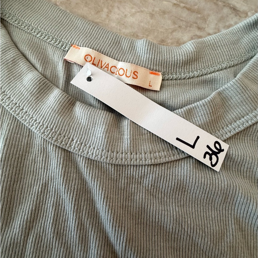 Olivaceous Light gray/pale celery green tank top.